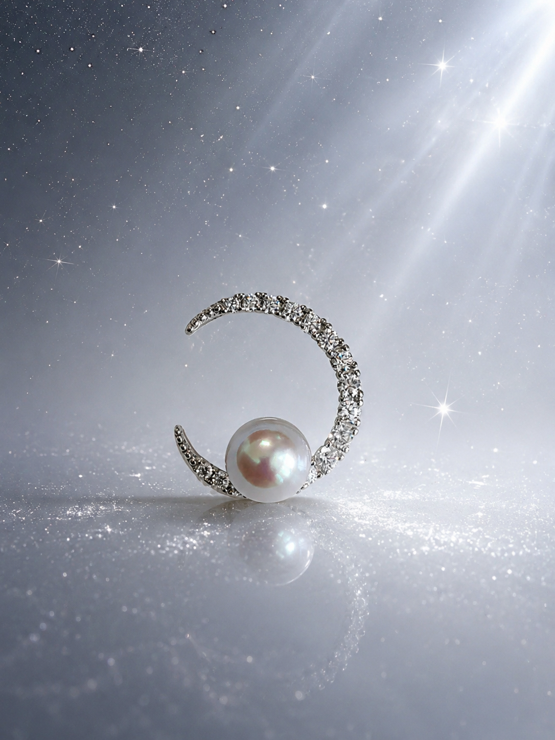 Silver crescent pearl pendant with round pearl centerpiece and pavé stones on chain