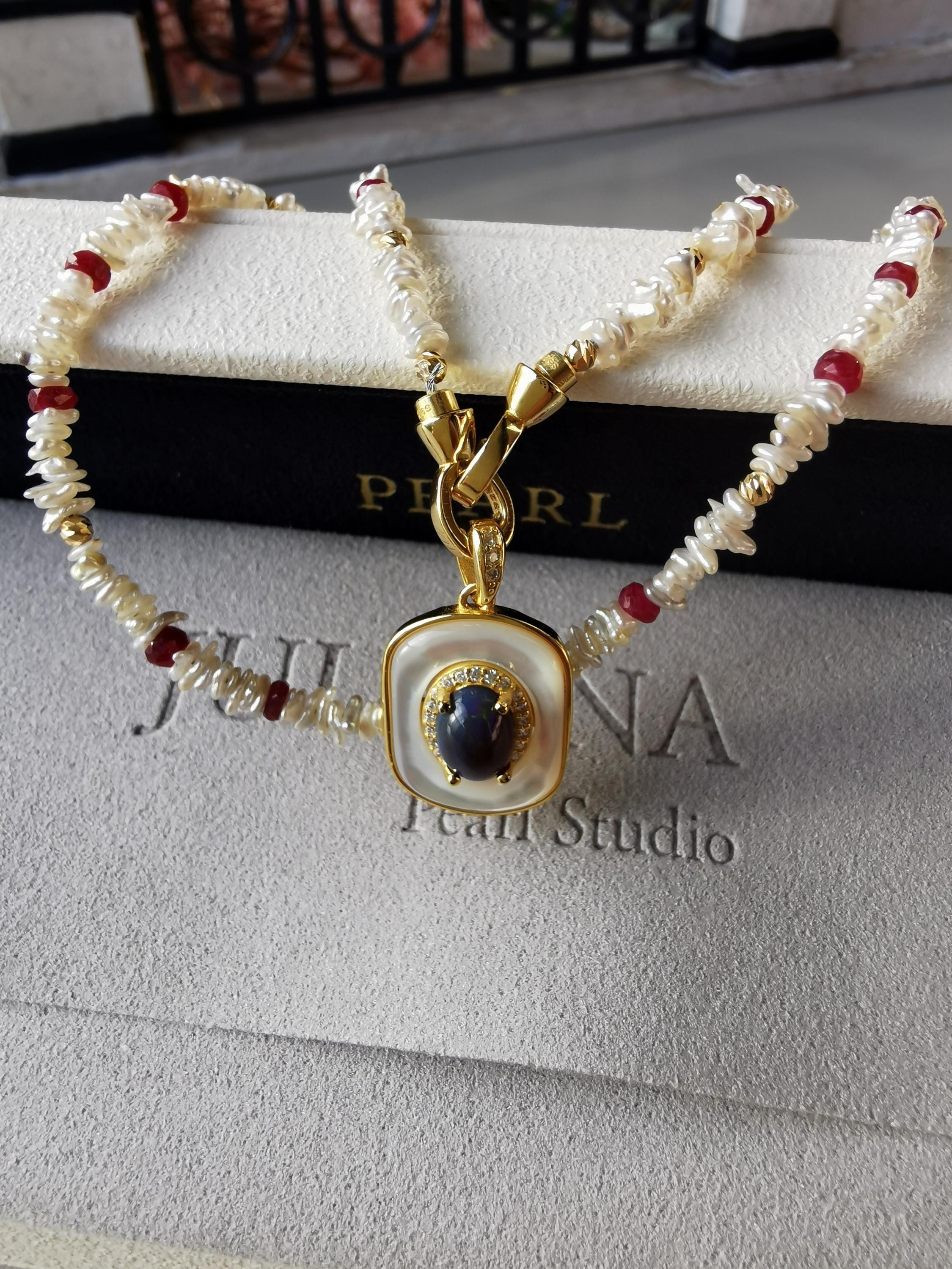 Pearl and red-bead necklace with blue opal-style pendant, layered chain