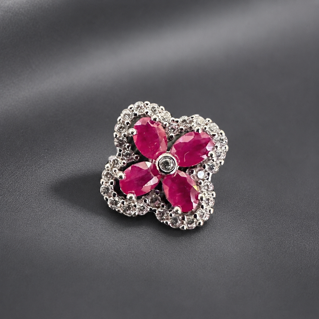 Sterling silver ruby clover flower pendant with five red stones