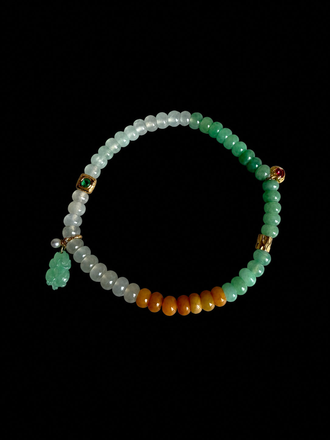 Jadeite bead bracelet with mixed green, white, and orange beads and gold charms