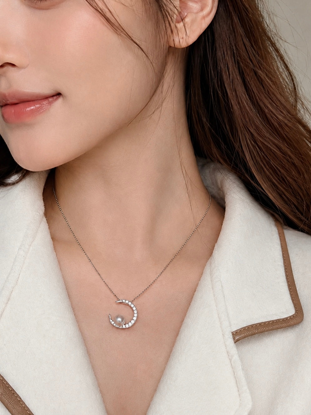 Silver pendant necklace with small Akoya pearl and crescent charm