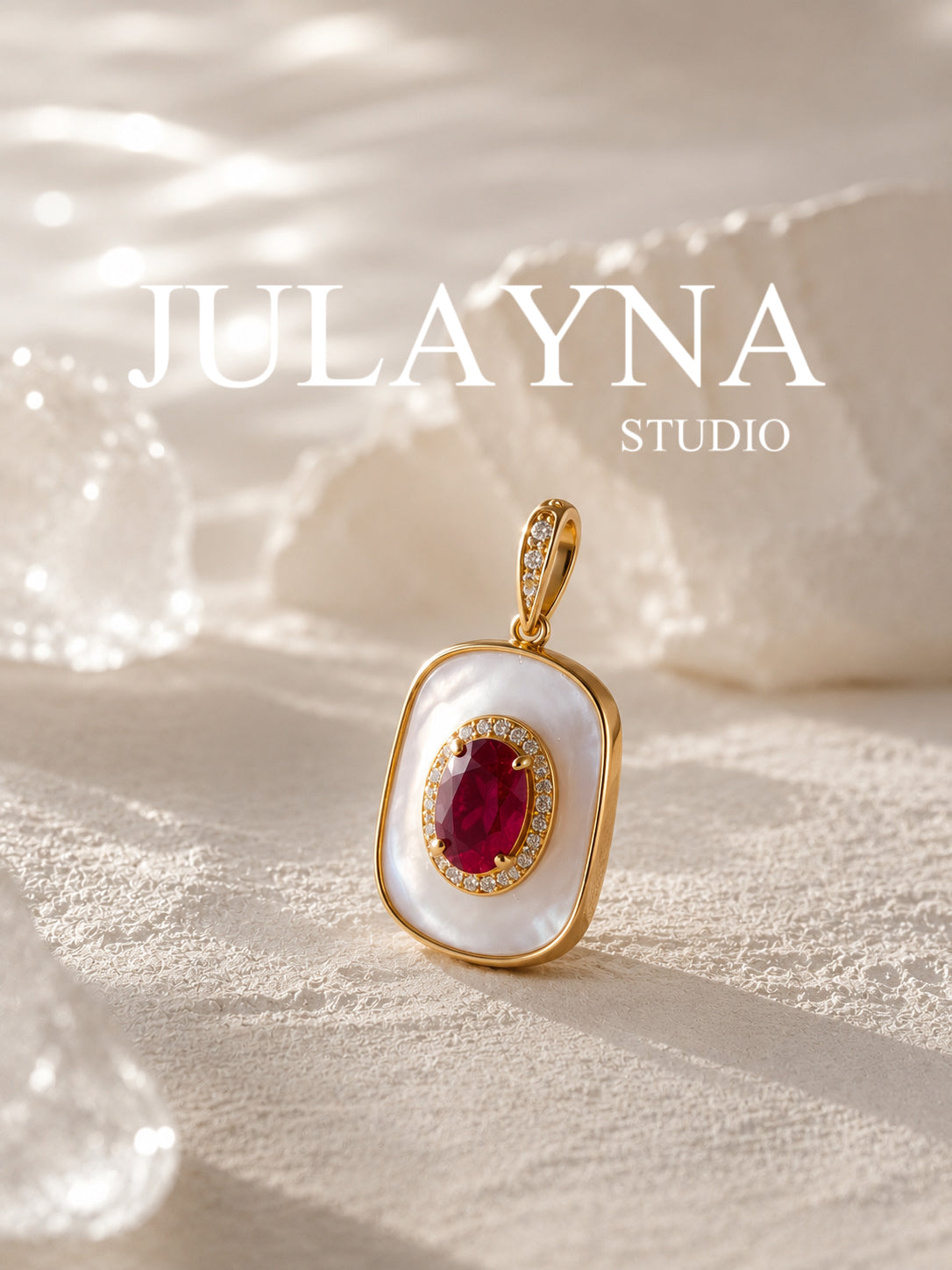 Gold-tone mother-of-pearl oval pendant with ruby center stone and top loop