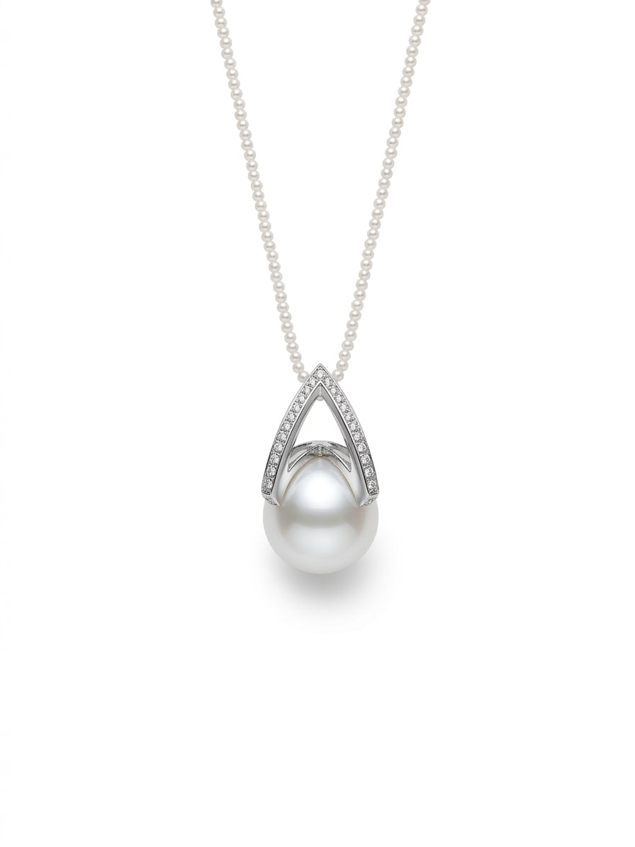 Pearl pendant with teardrop white pearl and pavé halo on a silver-tone chain