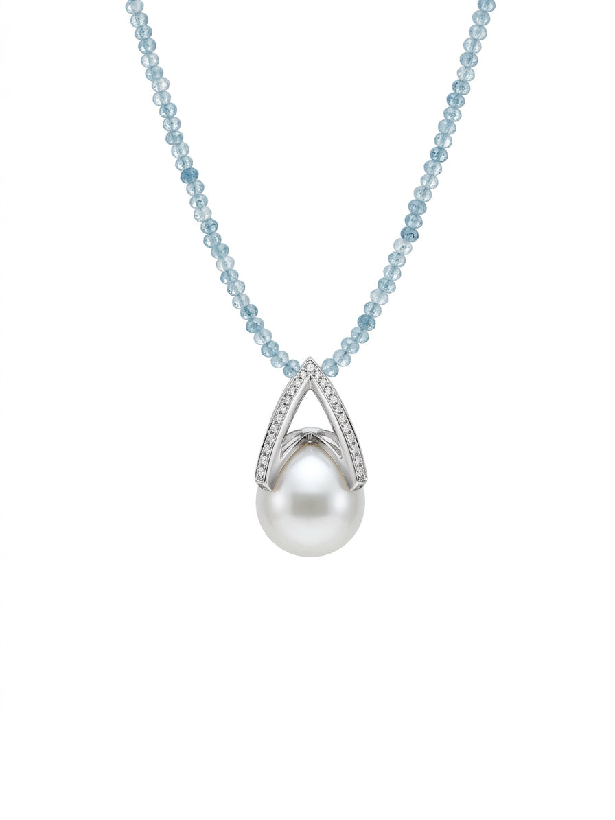 Pearl pendant on light blue chain with teardrop white pearl and pavé setting