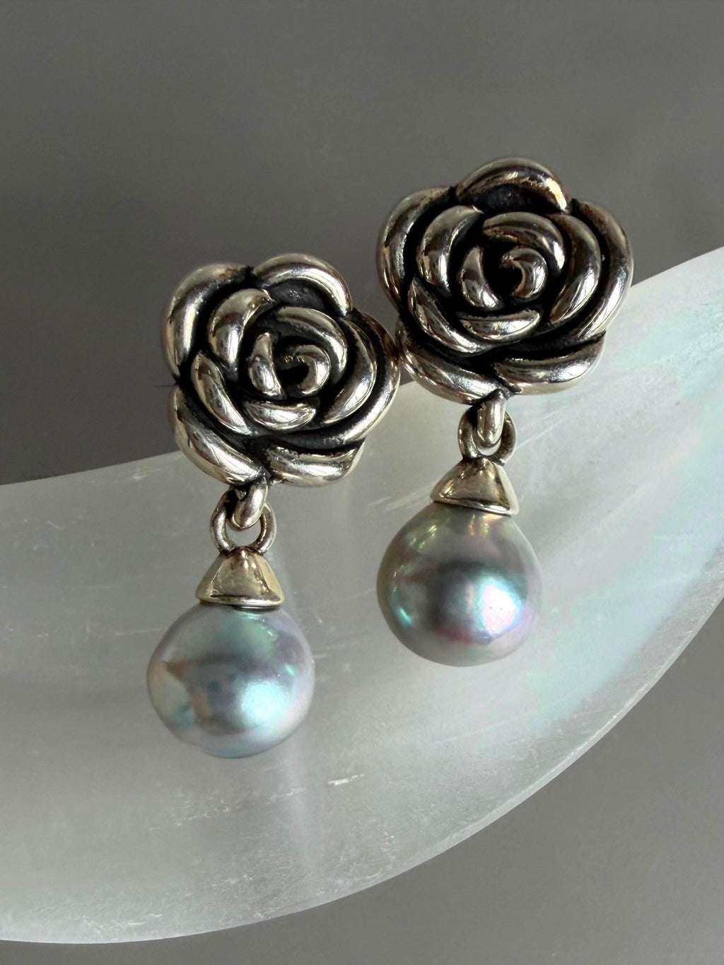 Sterling silver rose earrings with dangling gray-blue teardrop pearls