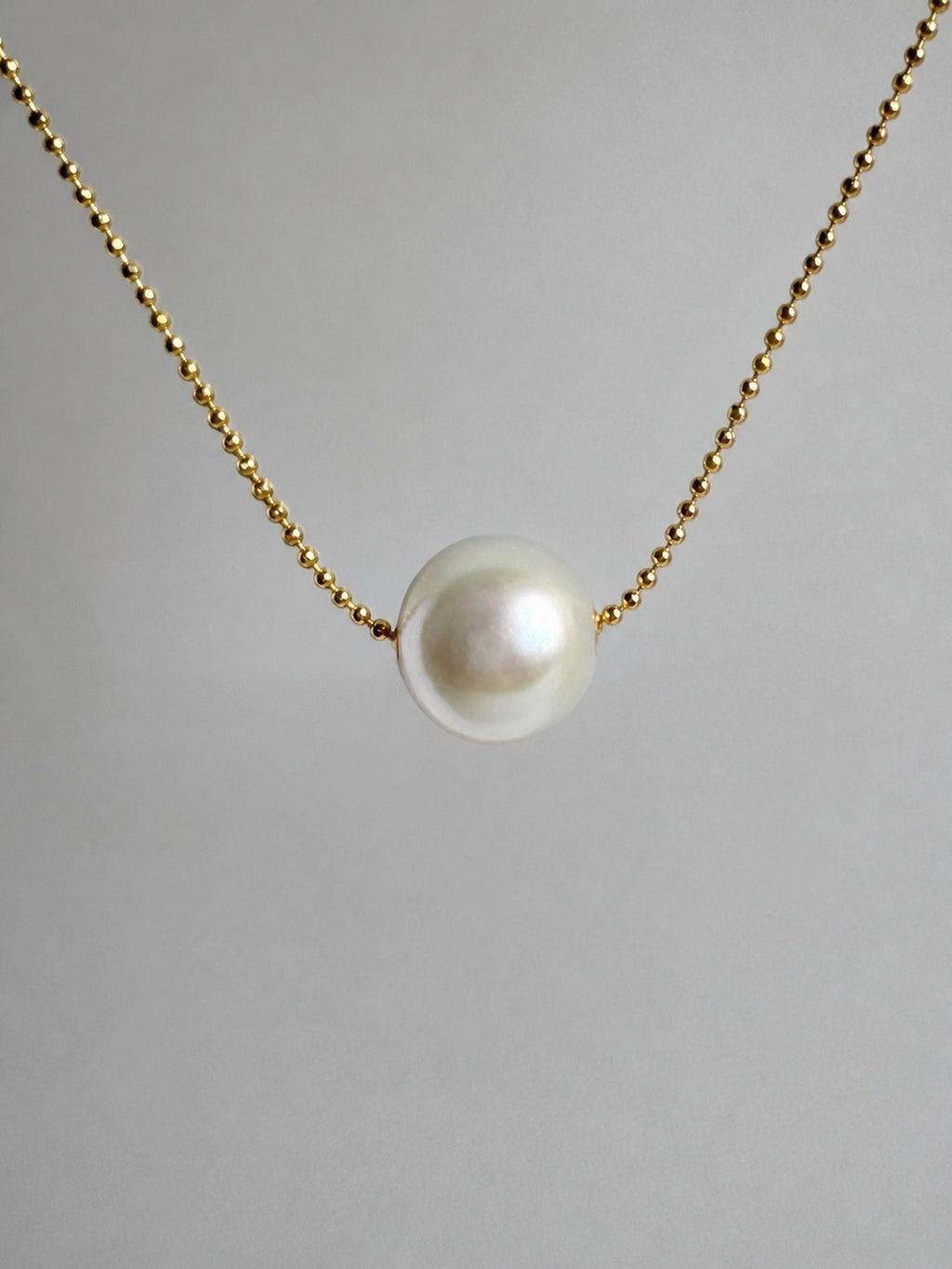 Gold-tone chain necklace with teardrop white freshwater pearl pendant