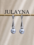 Silver-tone dangle earrings with faceted connectors and gray teardrop pearls