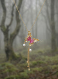Gold butterfly pendant with pink tourmaline and pearl tassels on a thin chain