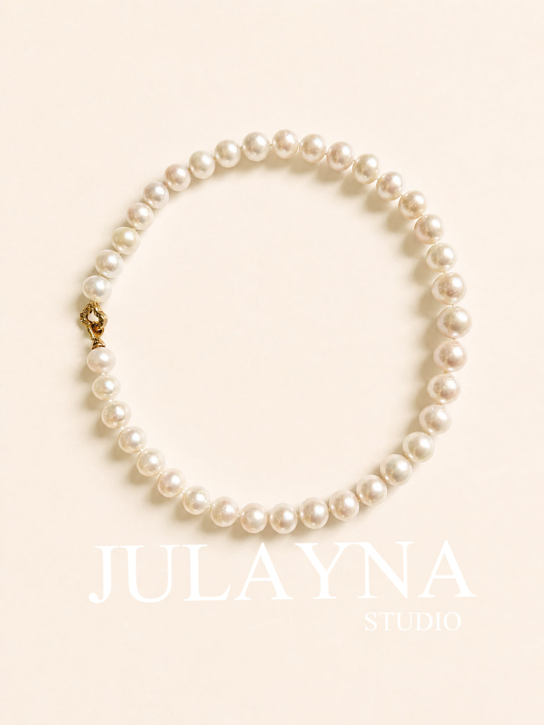 Pearl bead necklace with gold-tone charm clasp, white all-nacre pearls