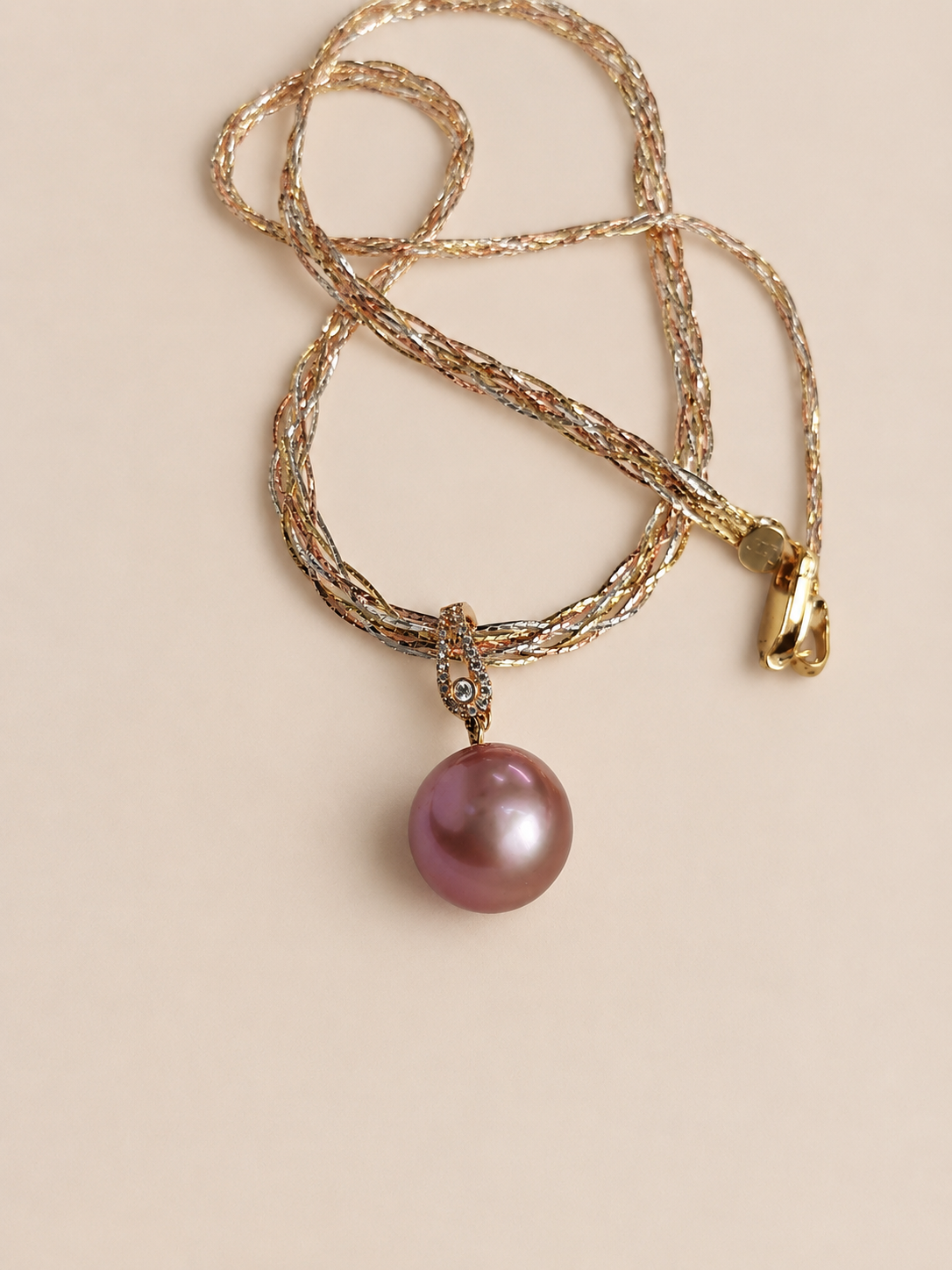 18K gold necklace with purple pearl pendant and small diamond halo