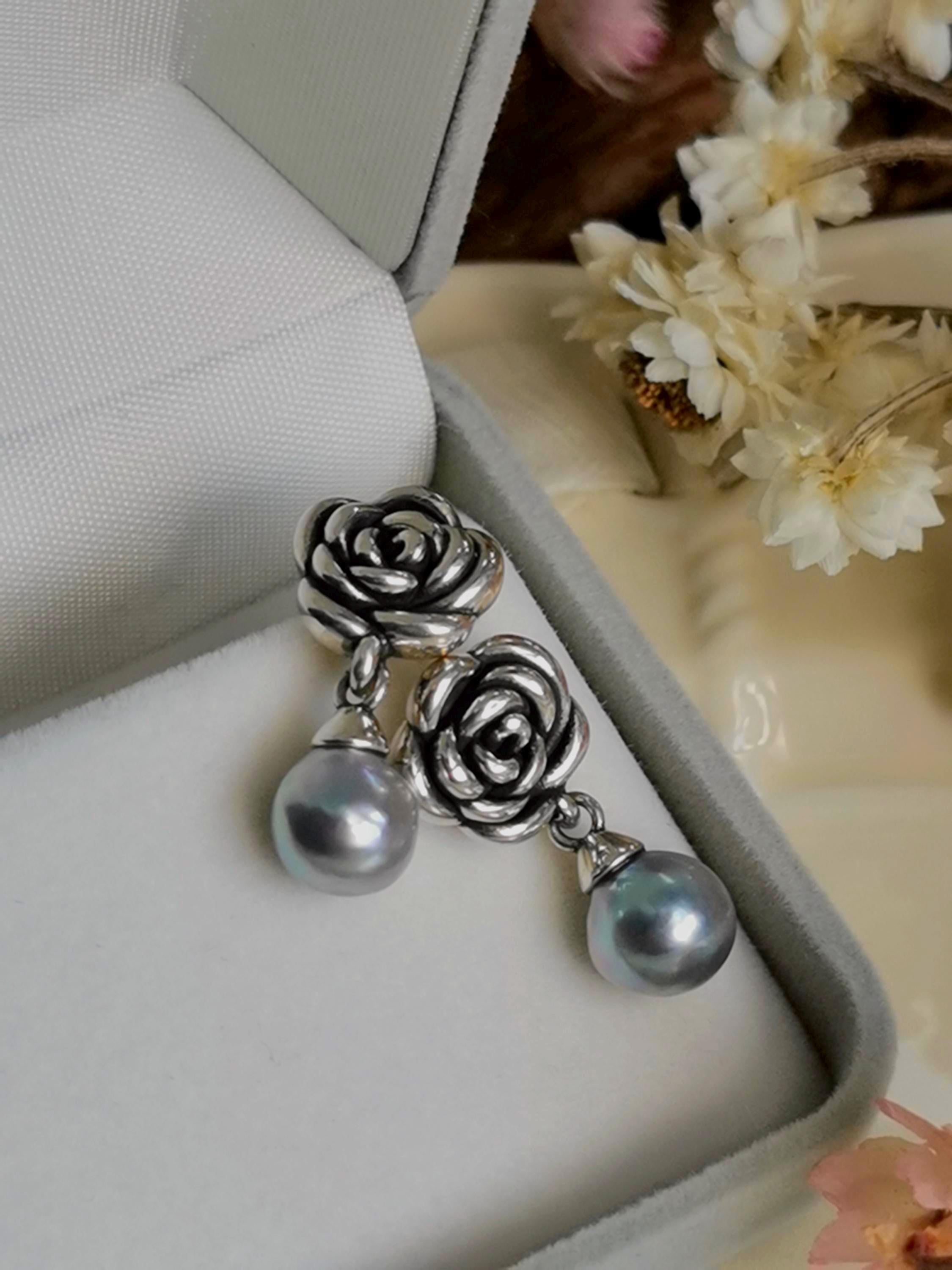 Silver rose dangle earrings with two pearl drop charms in a gift box
