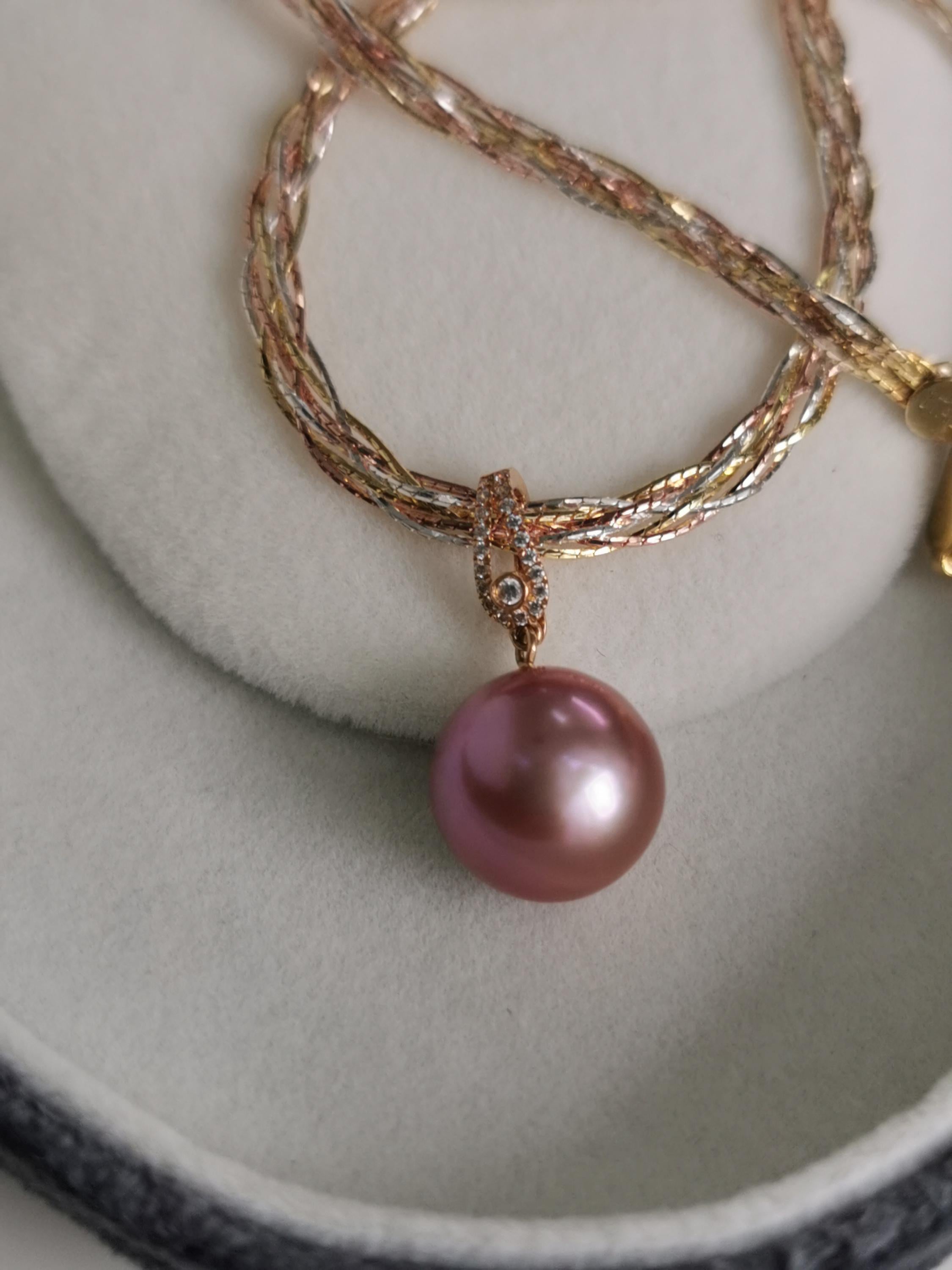 Diamond-set gold pearl pendant with large purple pearl on layered chain