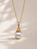 Gold pendant necklace with round South Sea pearl and pavé gemstone bail
