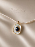 Pearl necklace with blue opal-style pendant, gold-tone frame and pearl strand