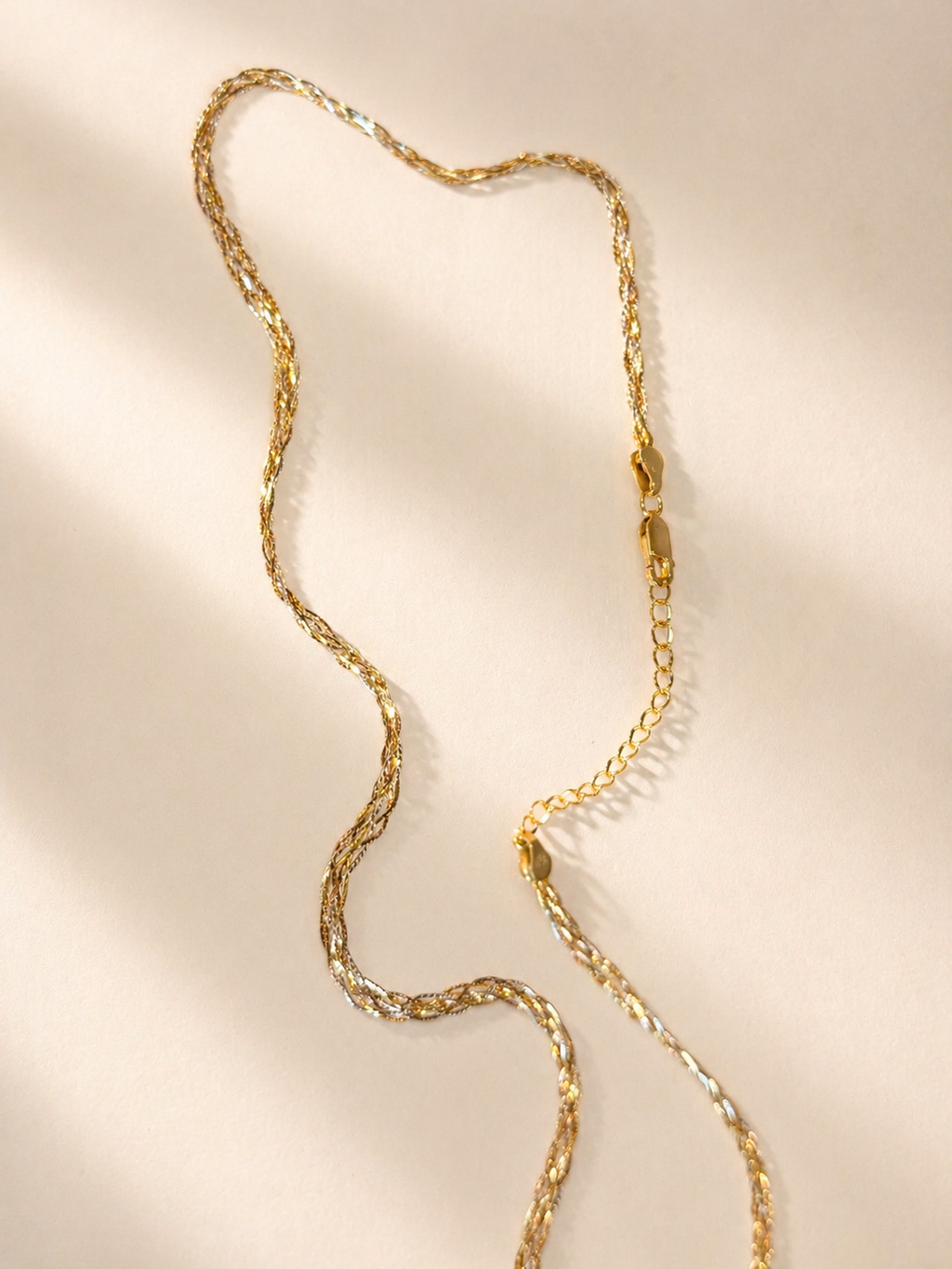 Three-tone gold braided necklace with S925 chain, wavy laid-back profile