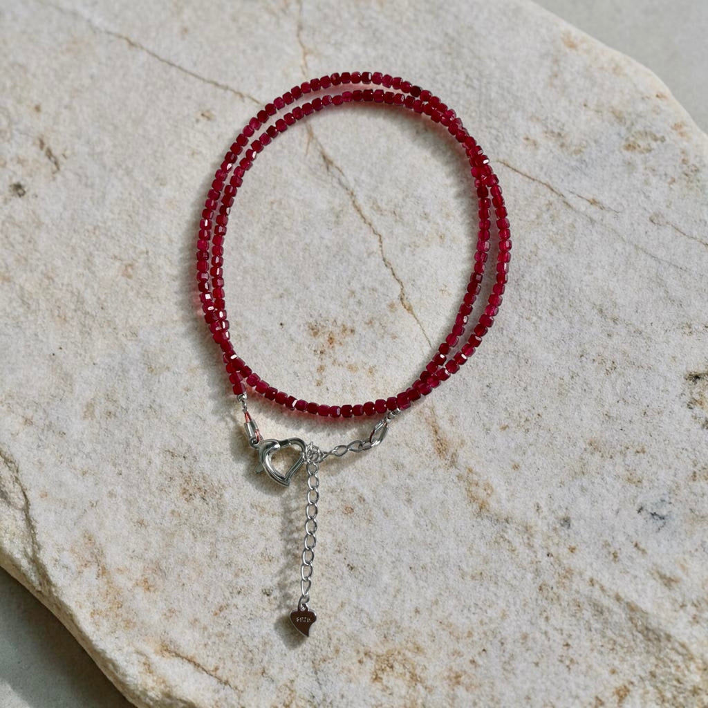 Ruby square-cut bead necklace with silver clasp and heart-shaped extender charm