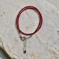 Ruby square-cut bead necklace with silver clasp and heart-shaped extender charm