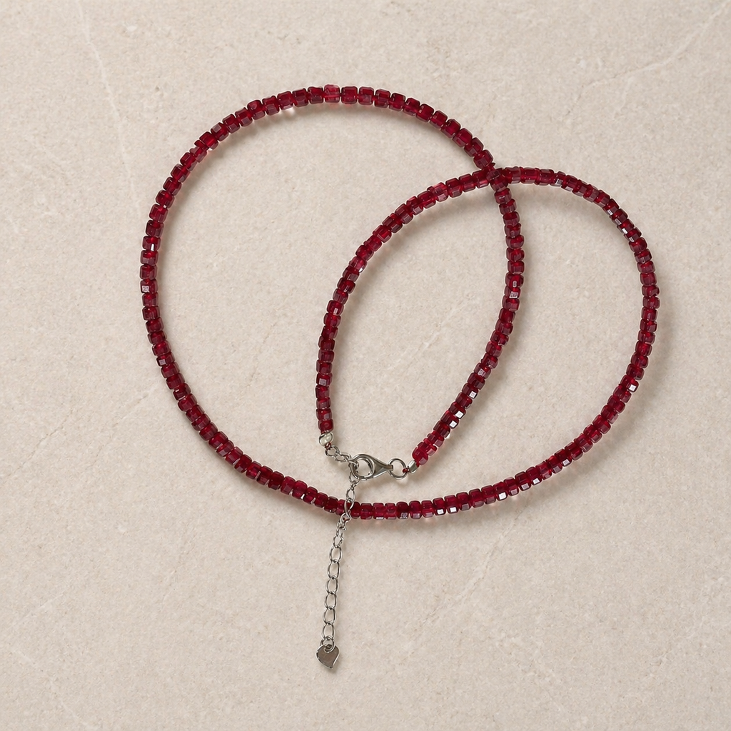 Ruby square-cut bead necklace with silver clasp and heart-shaped extender charm