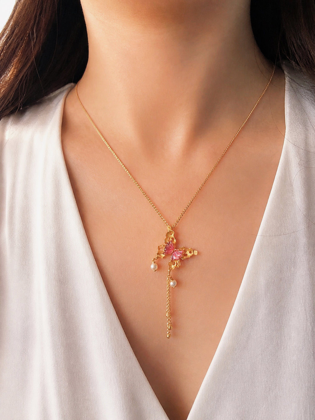 Gold butterfly pendant with pink tourmaline, pearl tassel, on a delicate chain