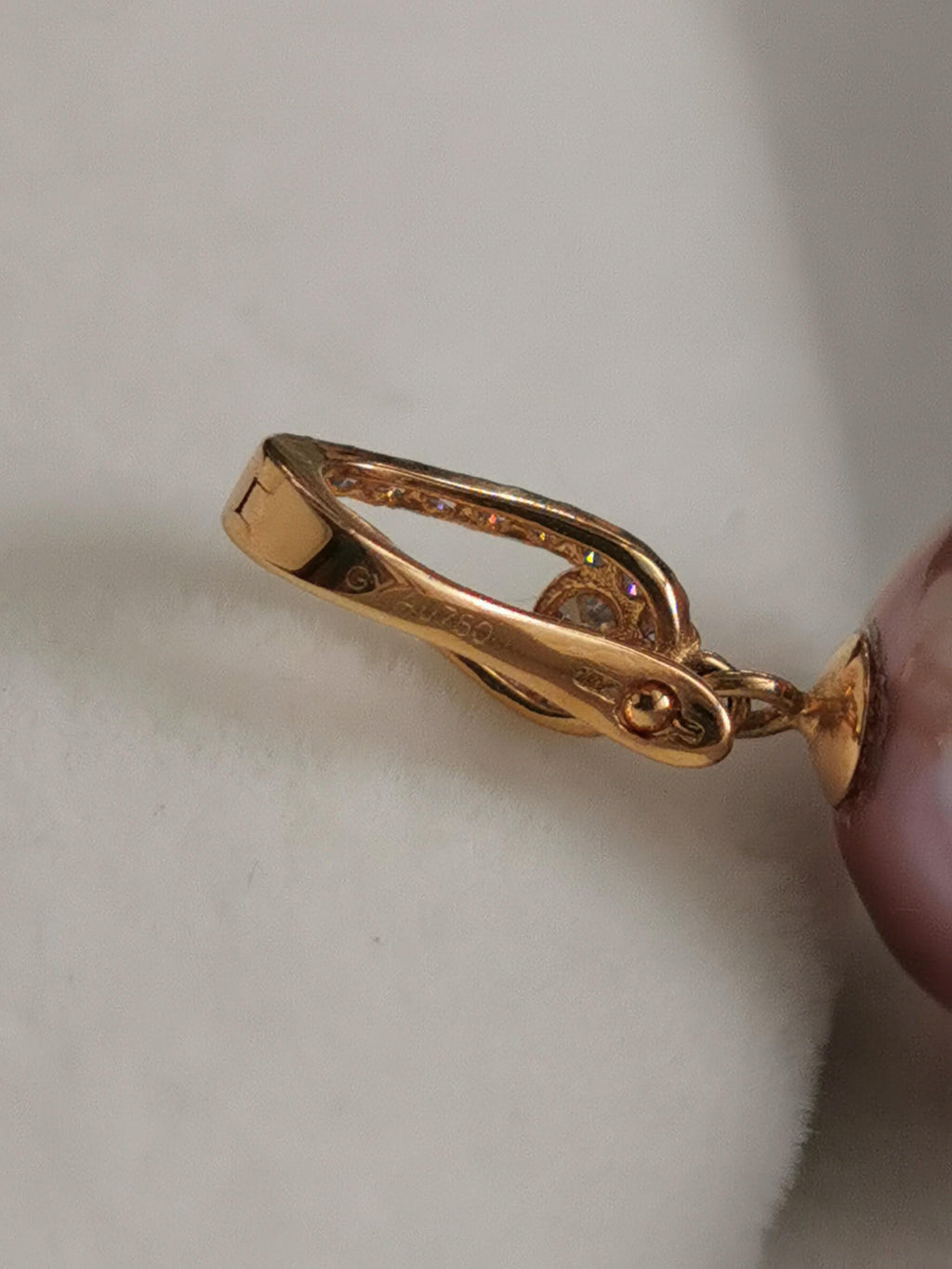 Gold clasp component with carved detailing for pearl pendant necklace