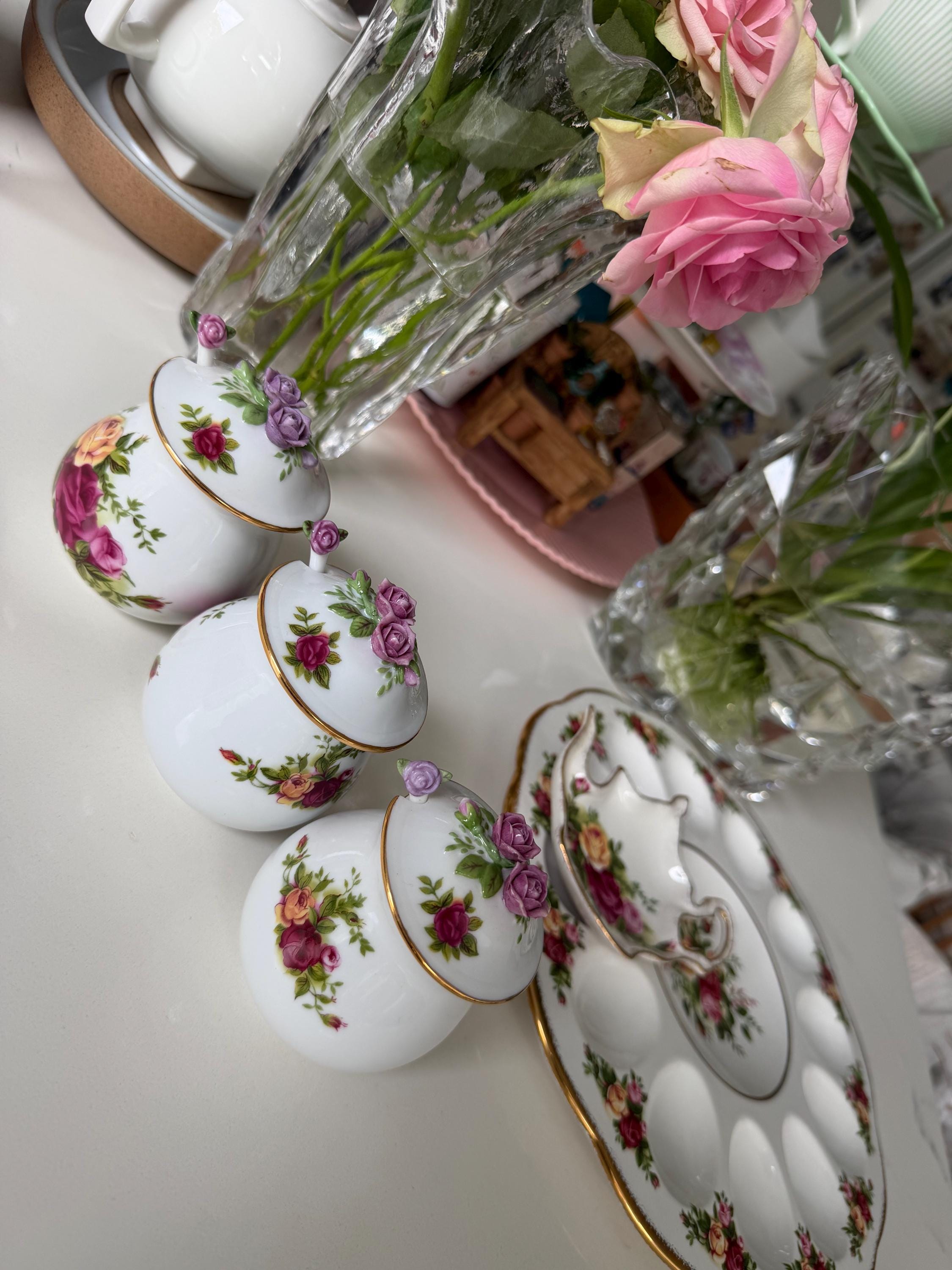 Porcelain sugar and salt jars with rose floral designs and gold trim, assorted angles