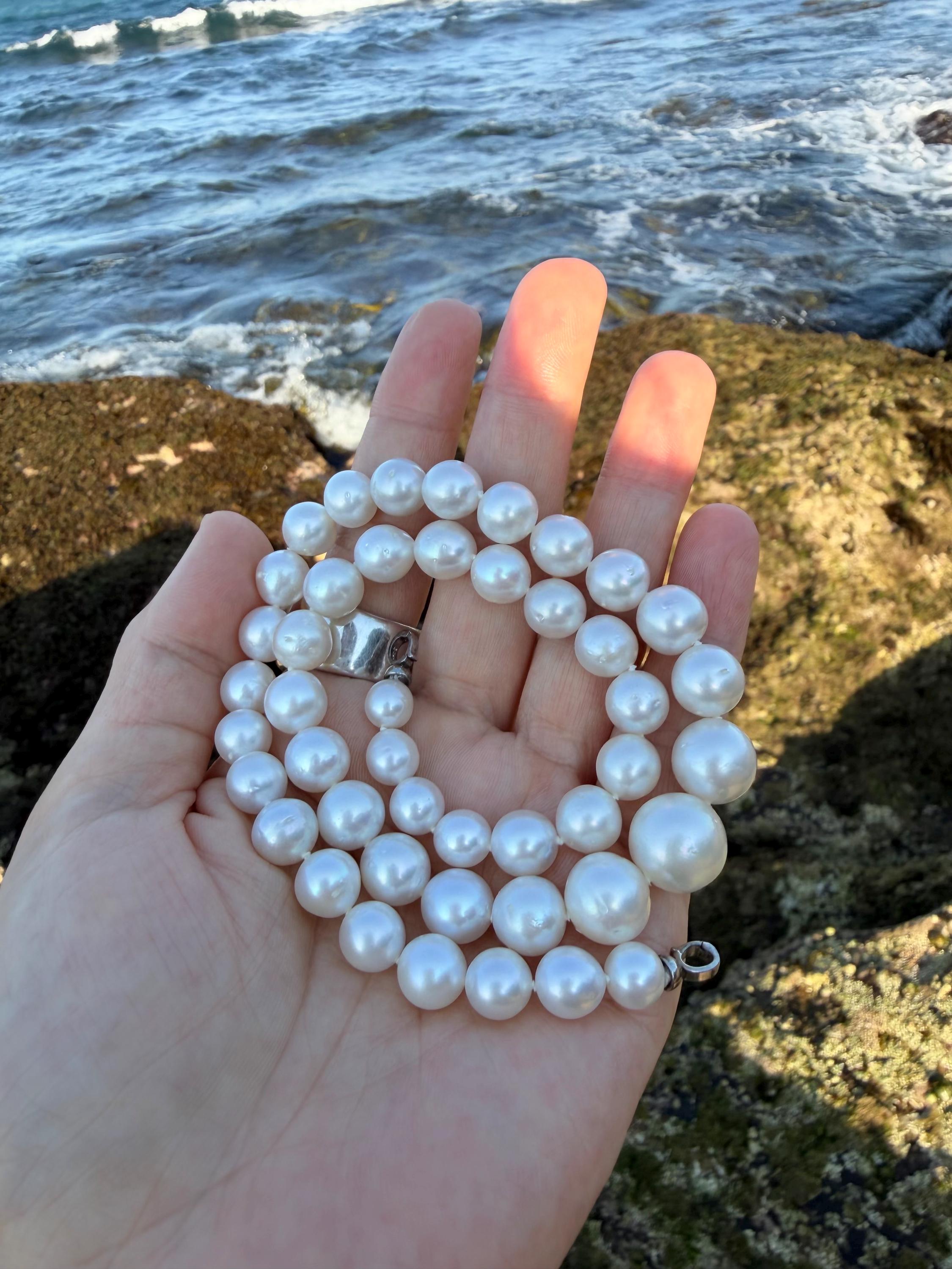 Layered white pearl necklace with silver-tone clasp